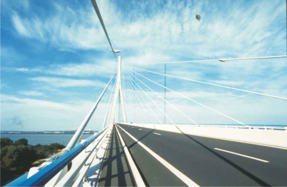 A photograph of the Pont de Normandie, in Northern France.  The road surface on the bridge has been made from co-polymers, including one using ethene and ethenyl ethanoate.  The ester is produced from ethanoic acid. 